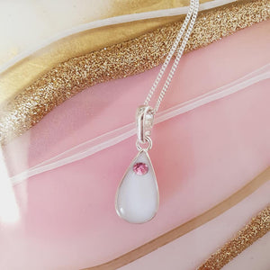 Swarovski drop Breast milk pendant. (resin)