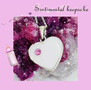 Swarovski heart Breastmilk pendant. (resin)