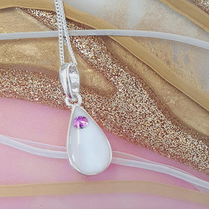 Swarovski drop Breast milk pendant. (resin)